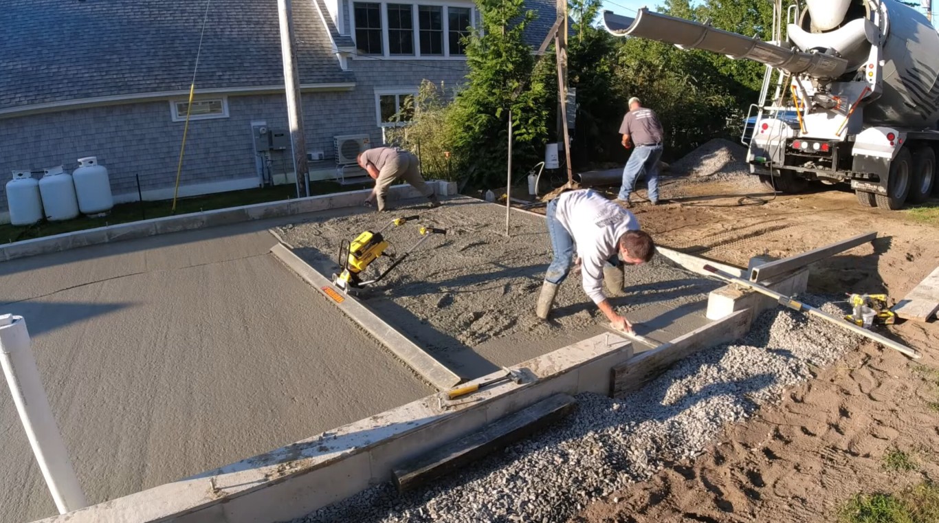 Professional concrete driveway installation crew working in Colton, CA